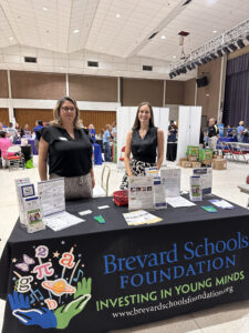 Amanda Thurn (L), Special Events and Grants Coordinator, and Nina Moser (R), Director of Development, at the PIE Fair sharing all things Brevard Schools Foundation with our teachers and community partners.